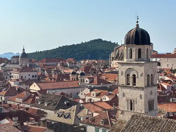 The tiled roofs and bell tower of Dubrovnik old town.