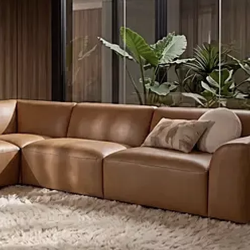 A tan leather modular sofa