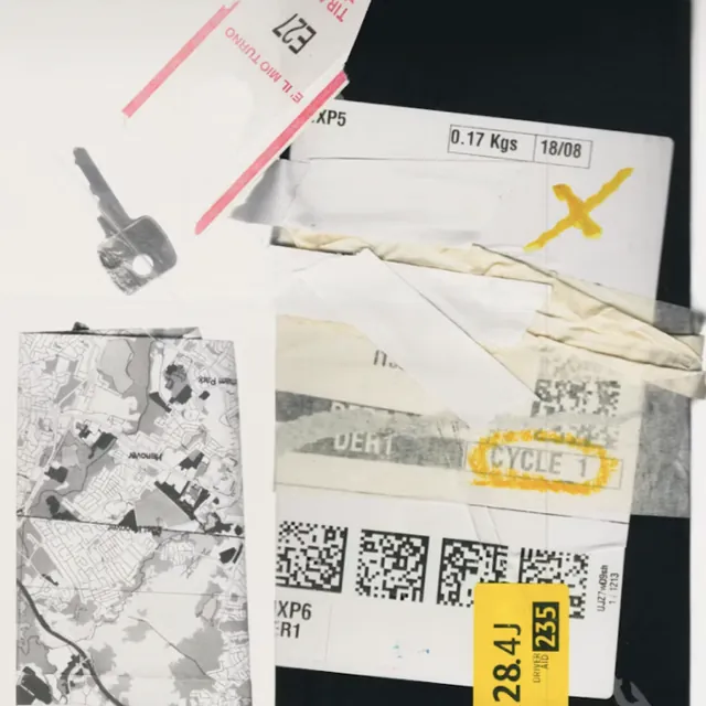 A flat lay of shipping labels, receipts, barcodes and tape