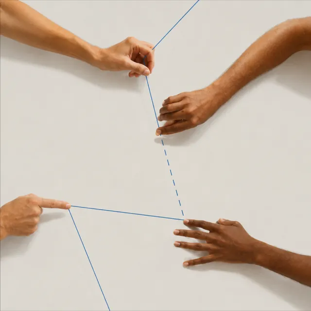 Four hands tracing a blue string route map across a pale surface