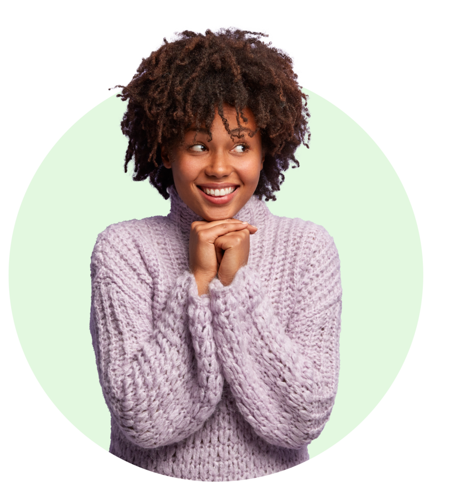 Woman in a purple sweater smiling